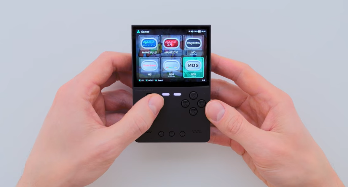 TrimUI Brick handheld showing retro game system categories on the main menu.